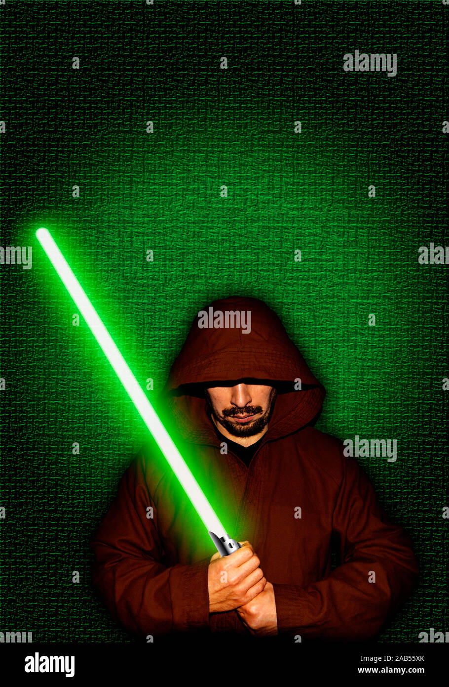 Jedi warrior with green lightsaber Stock Photo