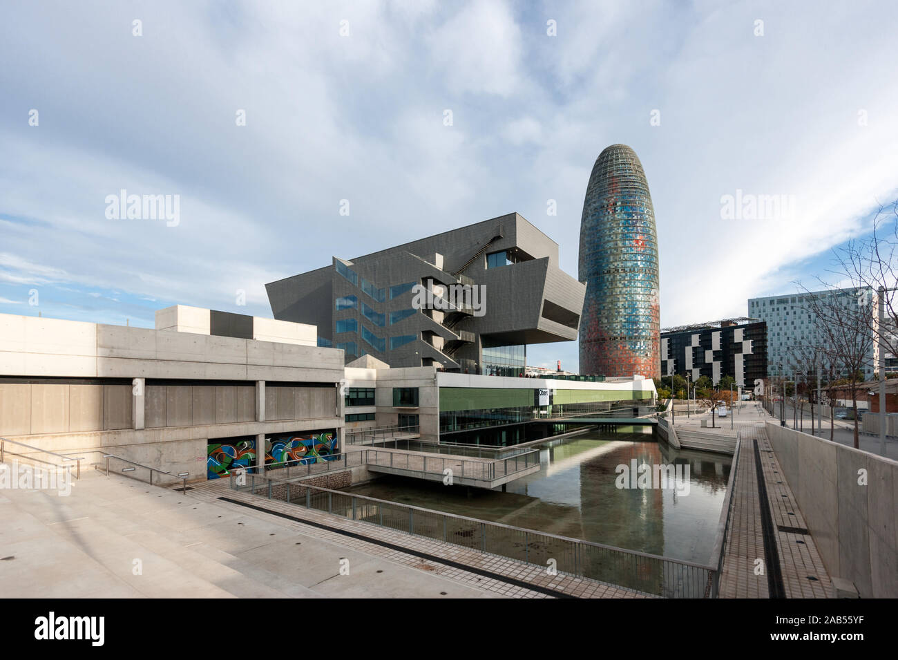 The Torre Agbar tower Torre Glories skyscraper by Jean Nouvel and the Museu del Disseny Design Museum by MBM architects, Barcelona, Catalonia, Spain Stock Photo