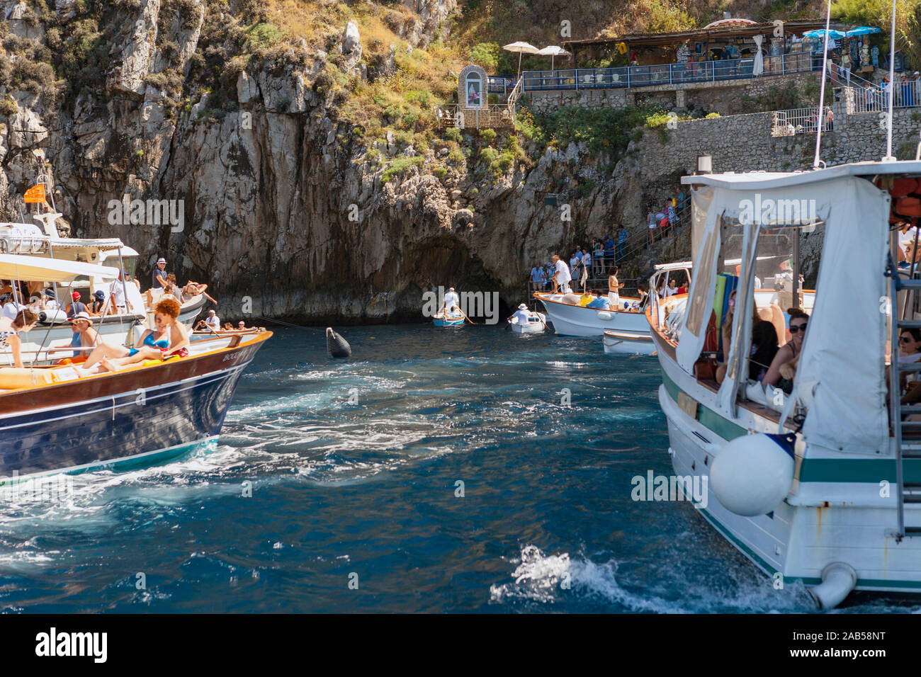 Boats queuing to visit the Blue Grotto, Capri Stock Photo