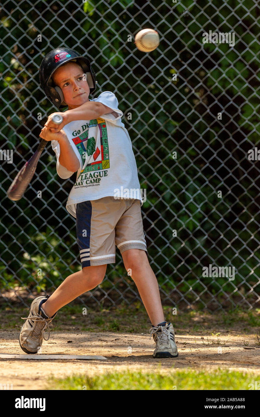 Boys playing softball at day camp Stock Photo - Alamy