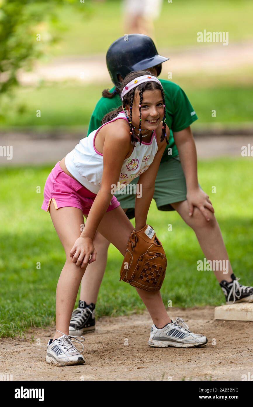 Girls playing softball at day camp Stock Photo Alamy