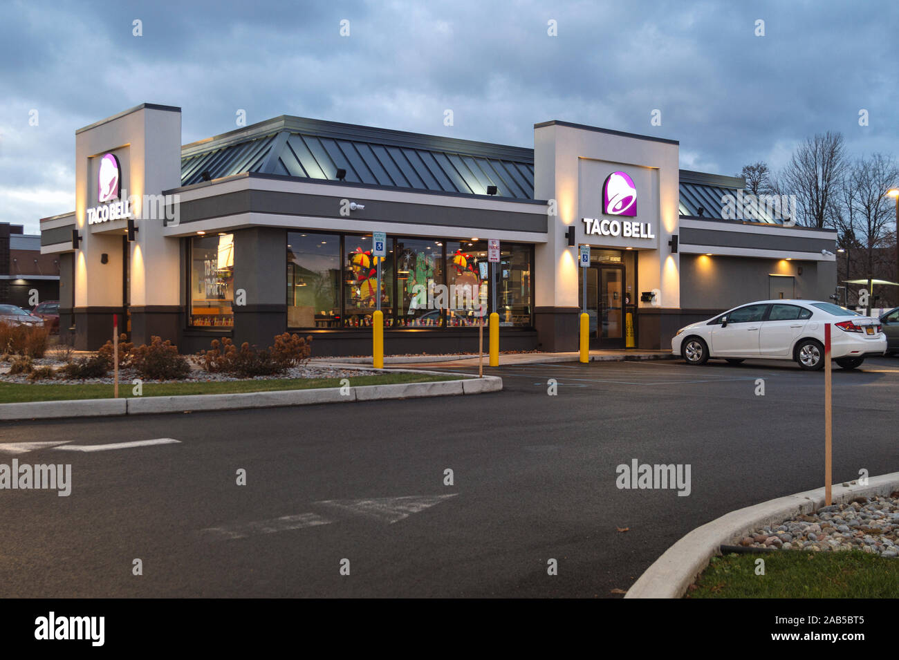 Whitesboro, New York - Nov 24, 2019: Taco Bell, a fast-food restaurant offering a Mexican inspired menu, serves has more than 5,800 locations. Stock Photo