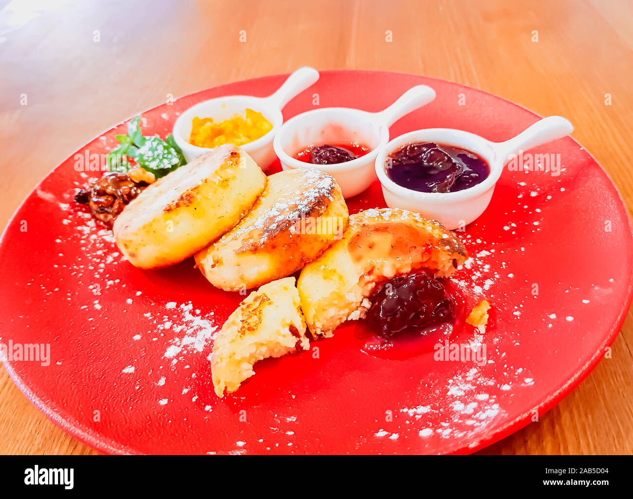 Cottage Cheese Pancakes With Almond Flour On A Red Plate Served
