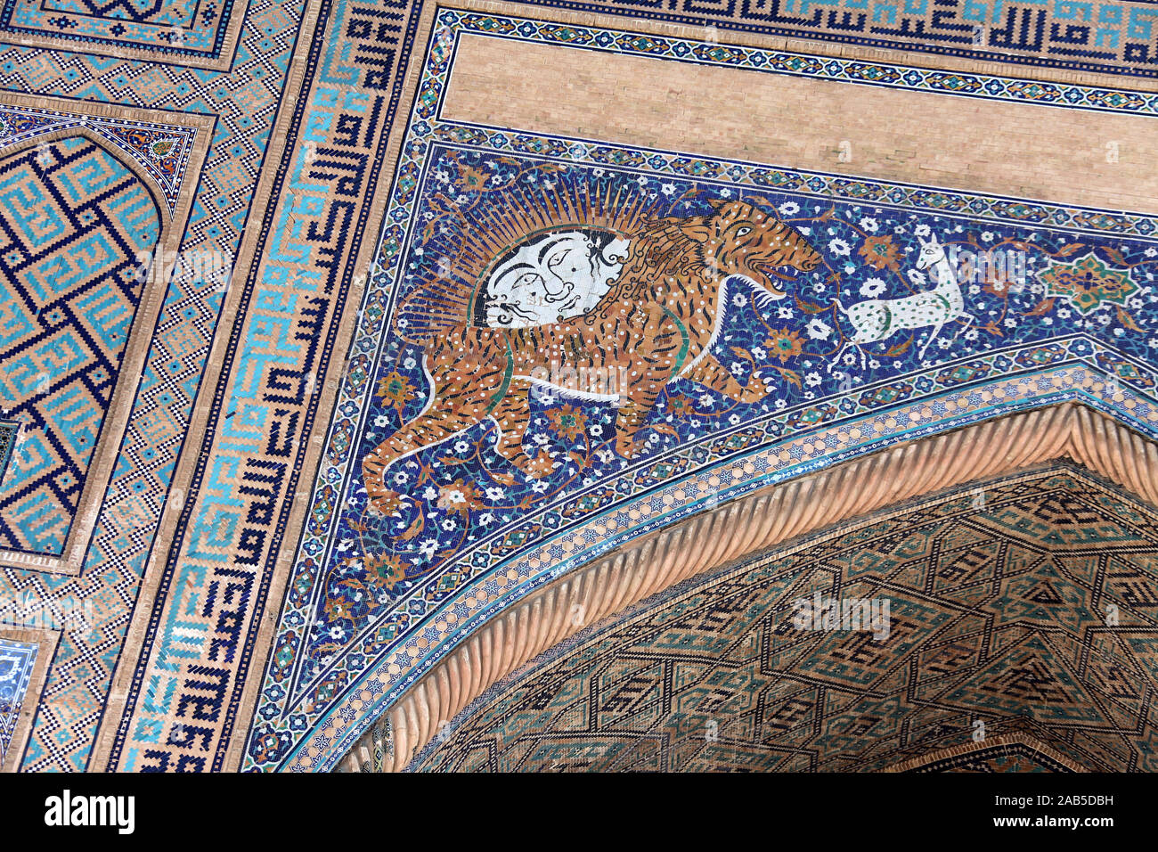 Tiger mosaic detail on Sher-Dor Madrasah in Samarkand Stock Photo