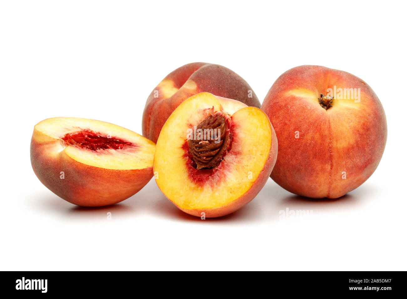 Ripe peach fruit with slice isolated on white background Stock Photo ...