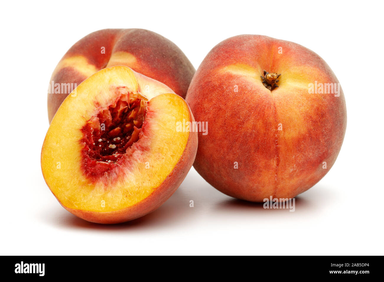 Ripe peach fruit with slice isolated on white background Stock Photo ...