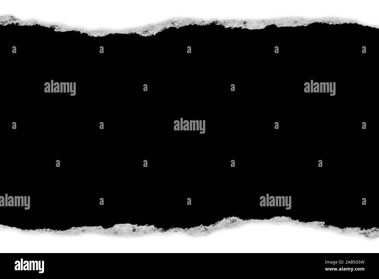 White paper with torn edges isolated with a black isolated background ...