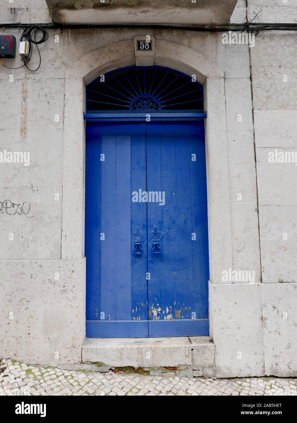 Blue doorway in the Santos area of Lisbon in Portugal Stock Photo