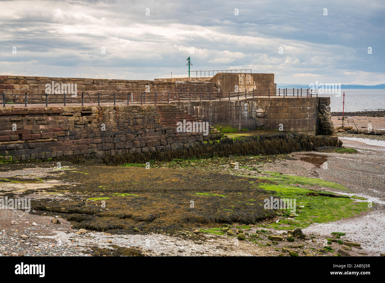 View at the Eller Beck and the harbour walls in Harrington, Cumbria, England, UK Stock Photo Alamy