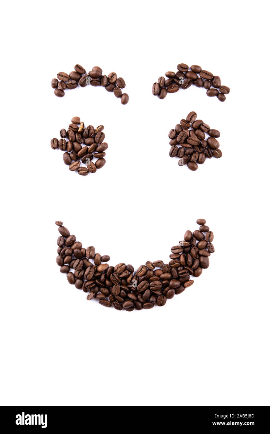Beans Smiley Smiley face made of coffee beans on white backgroud with copyspace ...