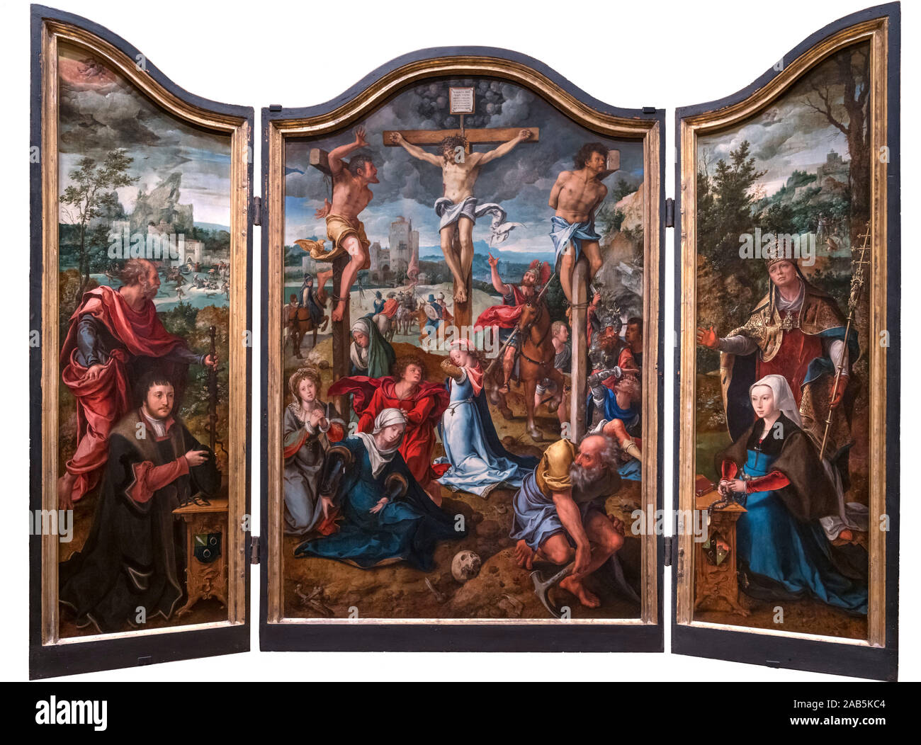 “Triptych: Crucifixion” by Pieter Coecke van Aelst (1502-1550), oil on oak panel, 1500s Stock Photo