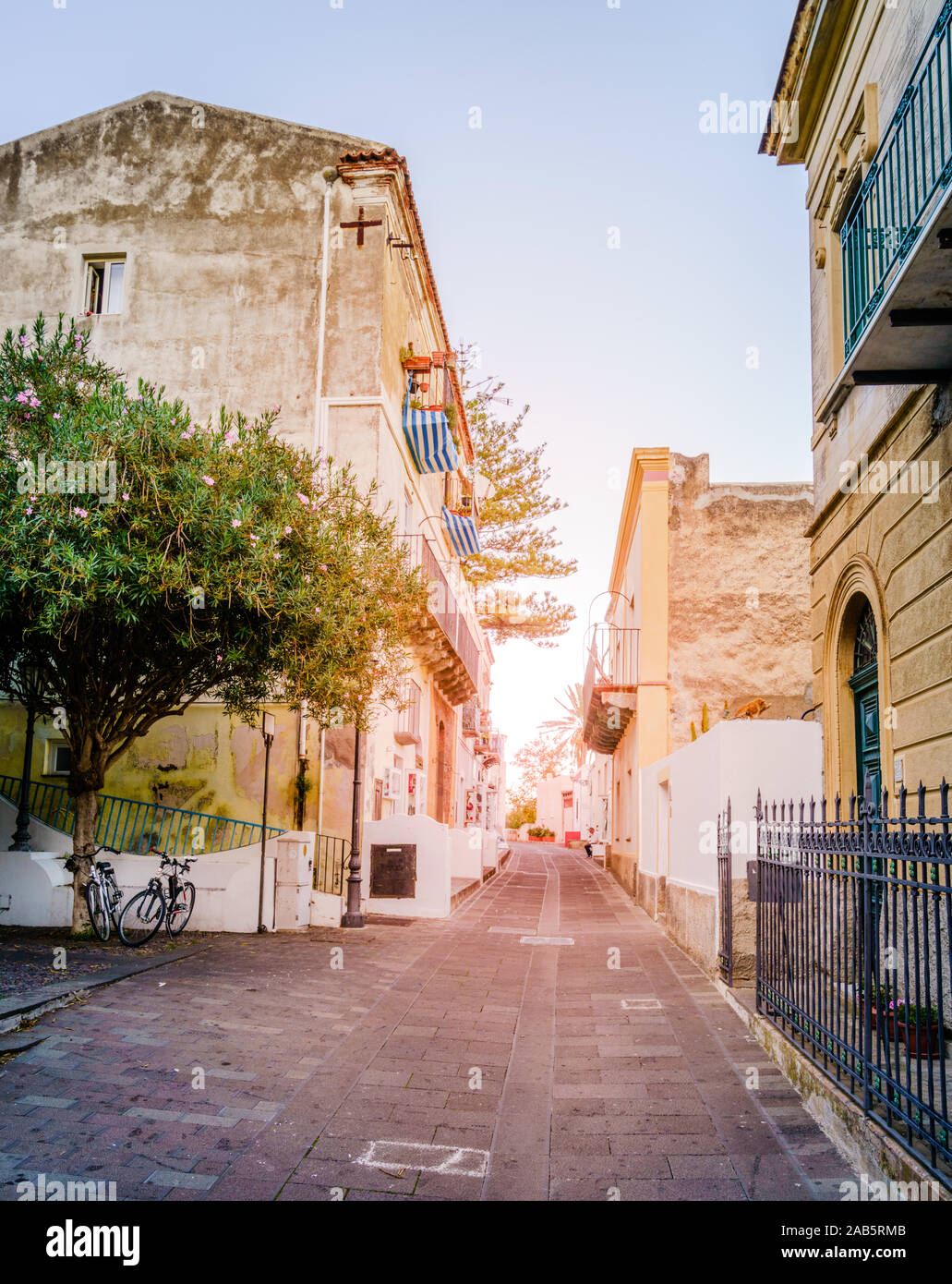 View down a pedestrian street in the town of Santa Marina on Salina island in Italy Stock Photo