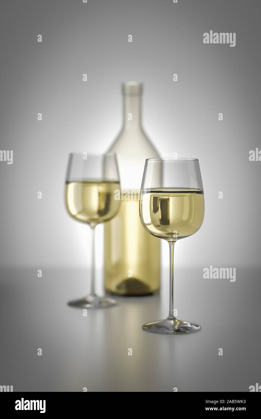 Eine Weissweinflasche mit zwei vollen Glaesern Stock Photo