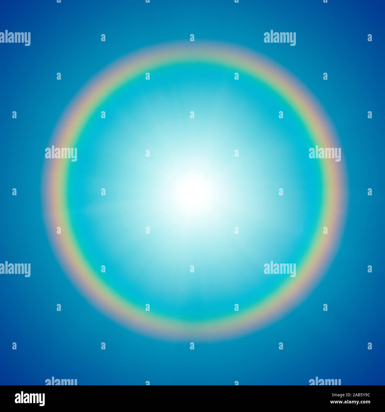 A photography of a rainbow around the sun Stock Photo