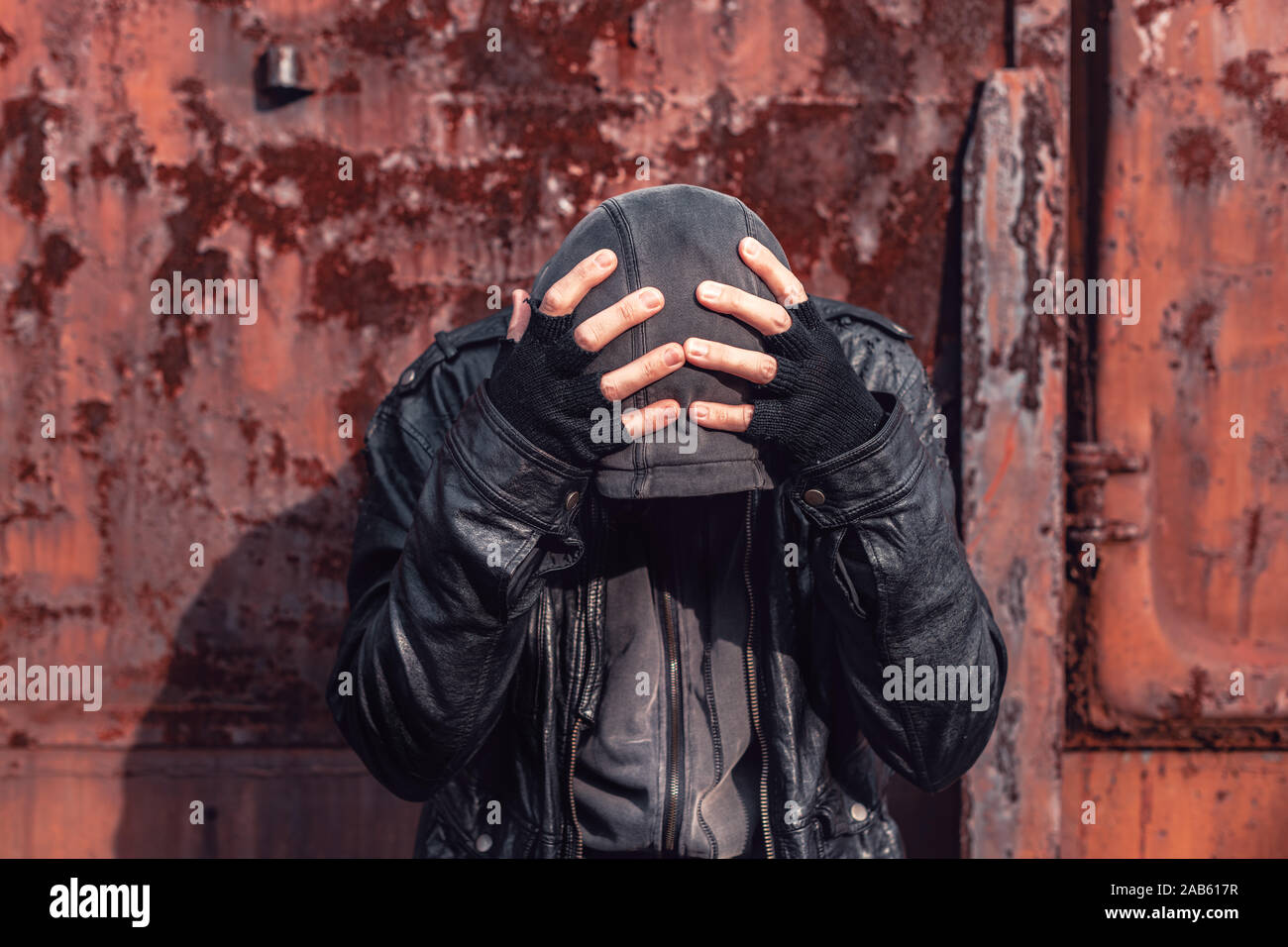 Homeless drug addict having abstinence crisis, conceptual portrait with selective focus Stock Photo