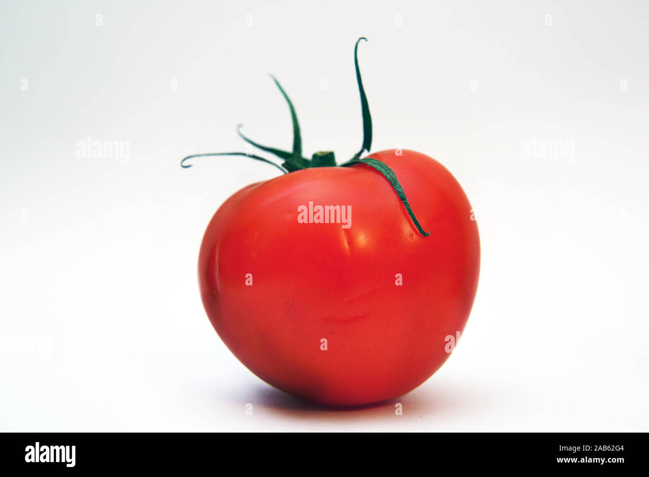 Red tomato isolated on white background. Clipping path . Fresh tomato ...