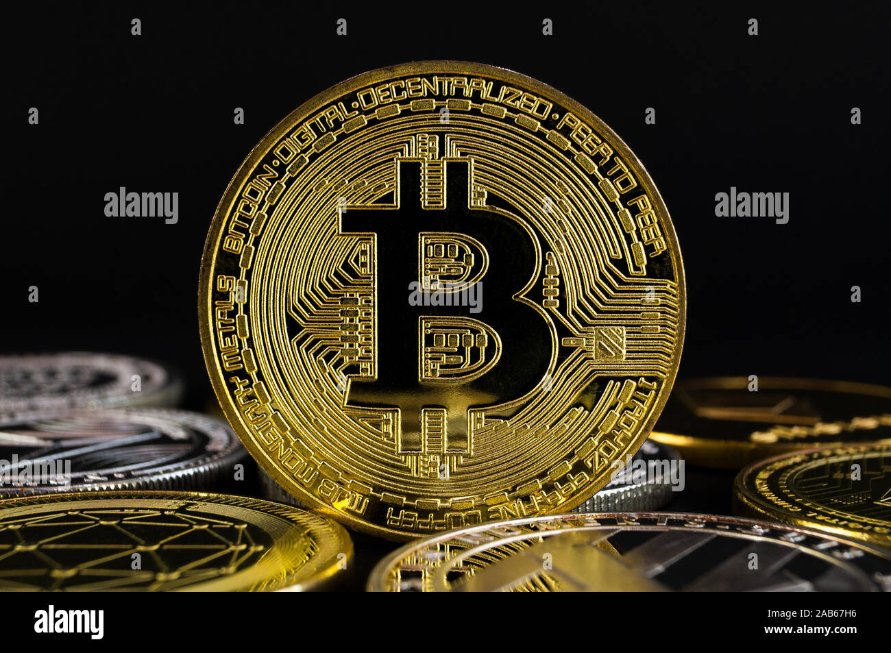 Bitcoin BTC cryptocurrency means of payment in the financial sector.  Close-up on black background Stock Photo - Alamy