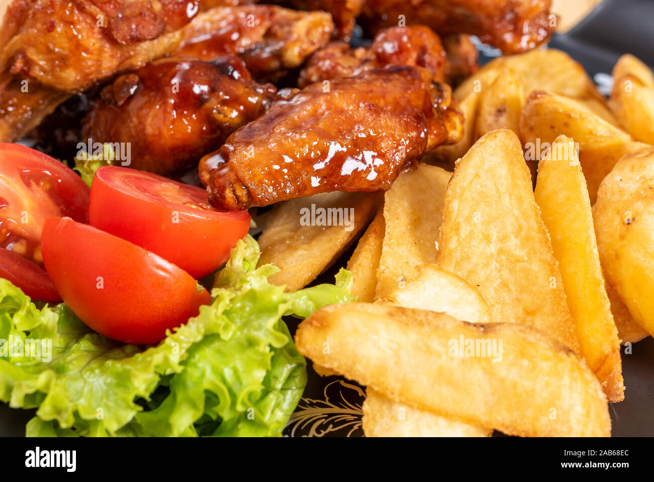 Chicken wings in sweet and sour sauce Stock Photo Alamy