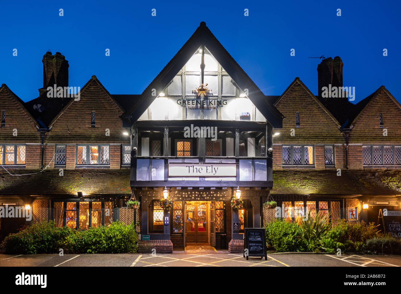 The Ely Hotel, night time exterior view with Christmas decorations, Blackwater, Hampshire, UK Stock Photo