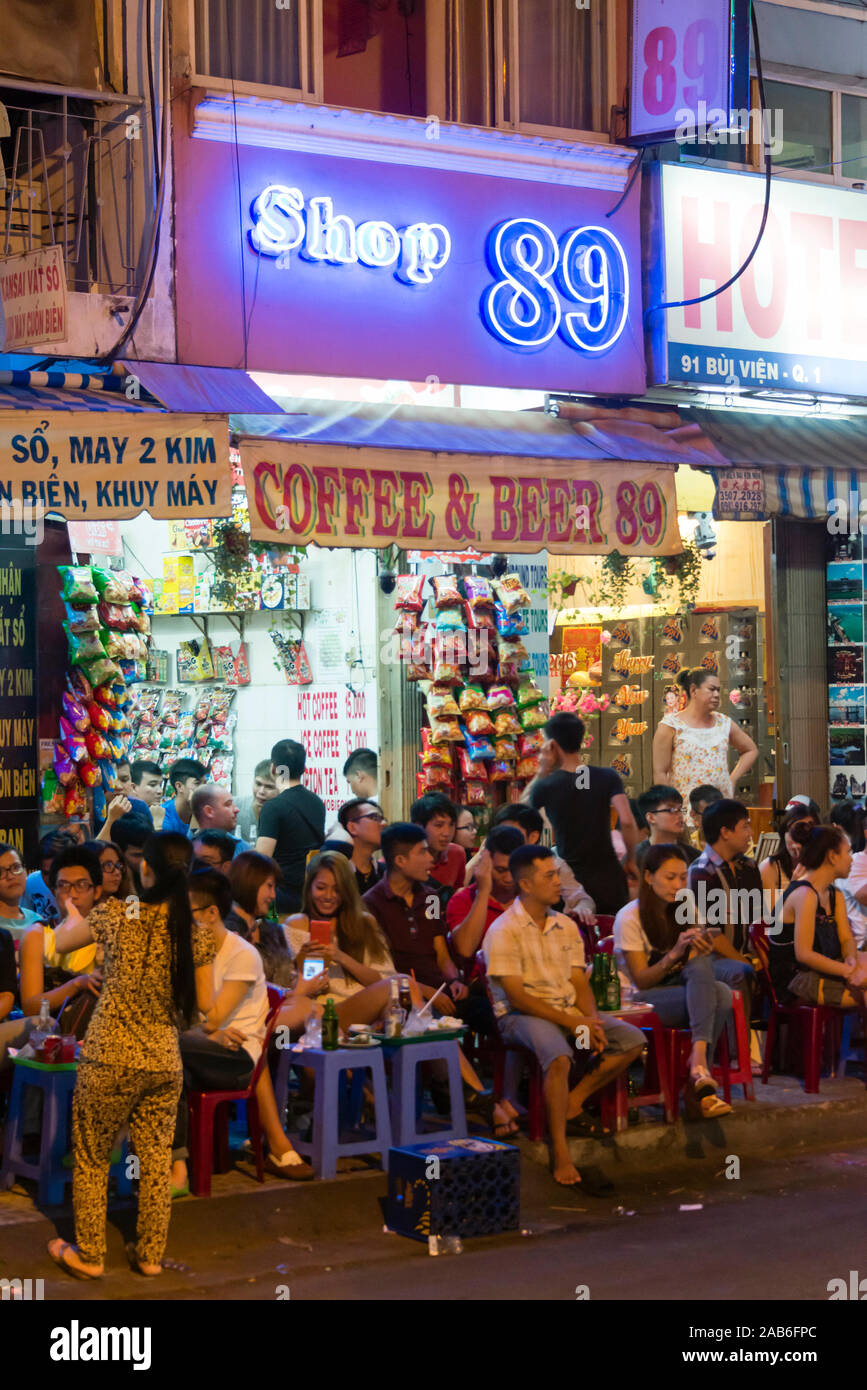 Ho Chi Minh City, Vietnam - January 16, 2016: Nightlife street scene in the popular nightlife entertainment destination of Bui Vien Street located in Stock Photo