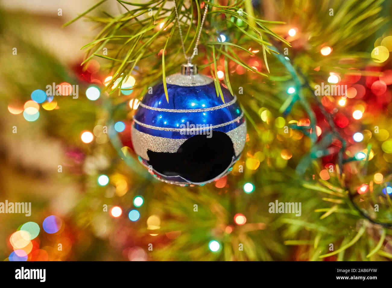 Still life with christmas tree and broken decoration balls. Holidays
