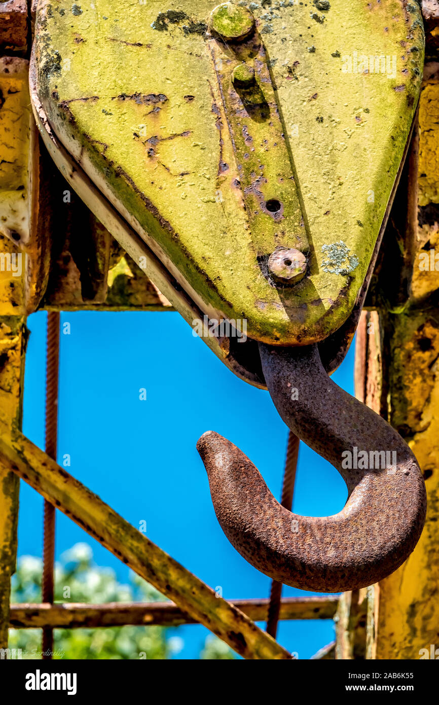Rusty old crane hook composition Stock Photo