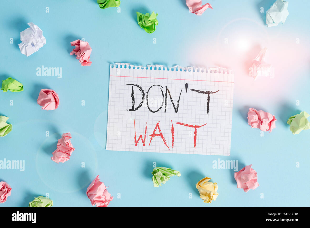Word writing text Don T Wait. Business photo showcasing Take action now and do something for a purpose Act quickly Colored crumpled rectangle shaped r Stock Photo