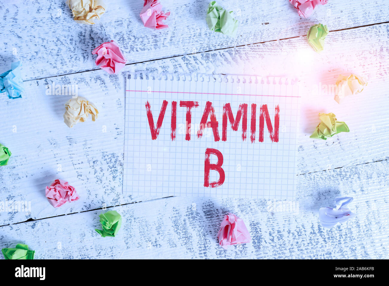 Handwriting text writing Vitamin B. Conceptual photo Nutrient that helps keep the body nerve and blood cells healthy Crumpled colored rectangle square Stock Photo