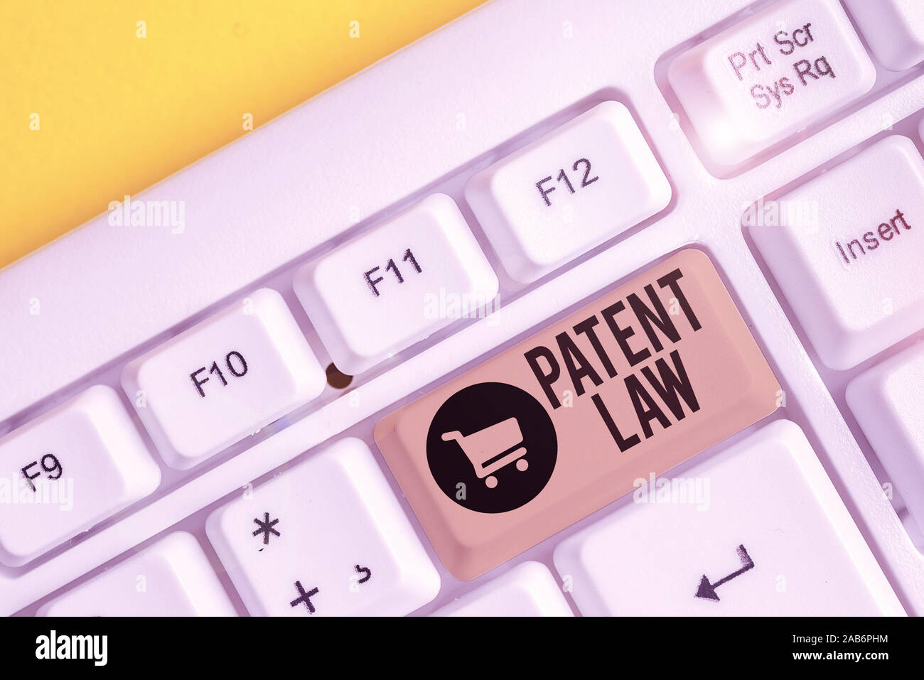Conceptual hand writing showing Patent Law. Concept meaning deals with an  inventor s is exclusive right to use own invention White pc keyboard with  no Stock Photo - Alamy
