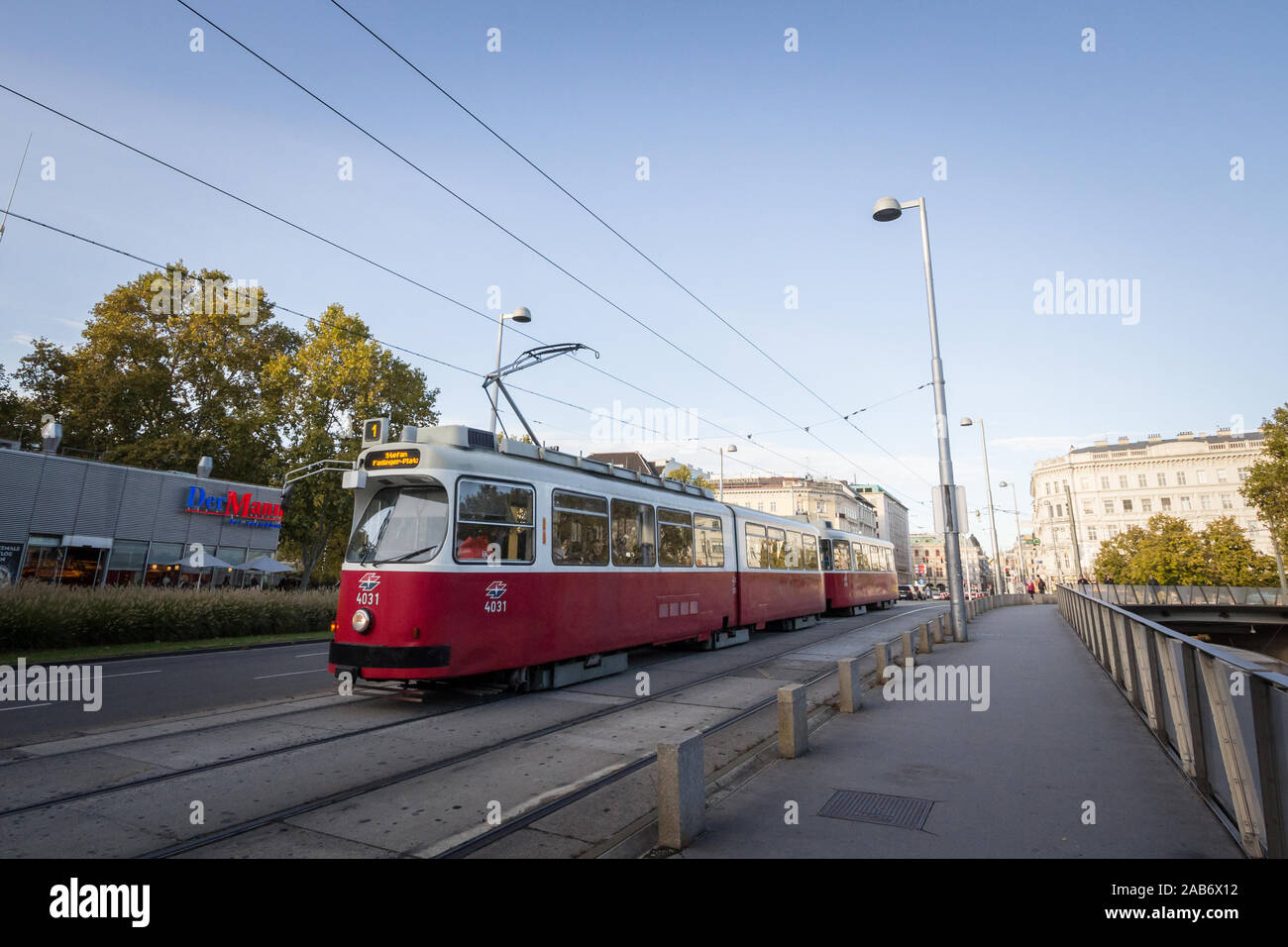 VIENNA, AUSTRIA - NOVEMBER 6, 2019: Vienna tram, also called strassenbahn, an old and traditional modern, passing by on the iconic ringstrasse in the Stock Photo