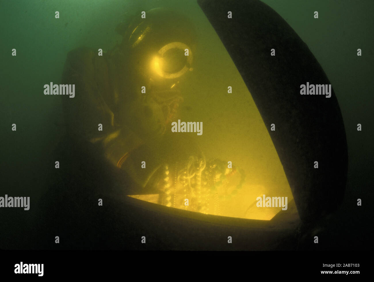 Navy hardhat diver in outdated gear, a Sibe Gorman standard diving