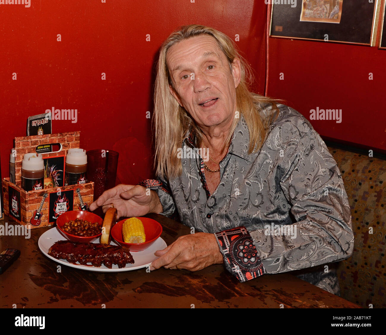 Coral Springs FL, USA. 25th Nov, 2019. Nicko McBrain of Iron Maiden poses  at his Restaurant Rock N Roll Ribs on November 25, 2019 in Coral Springs,  Florida. Credit: Mpi04/Media Punch/Alamy Live