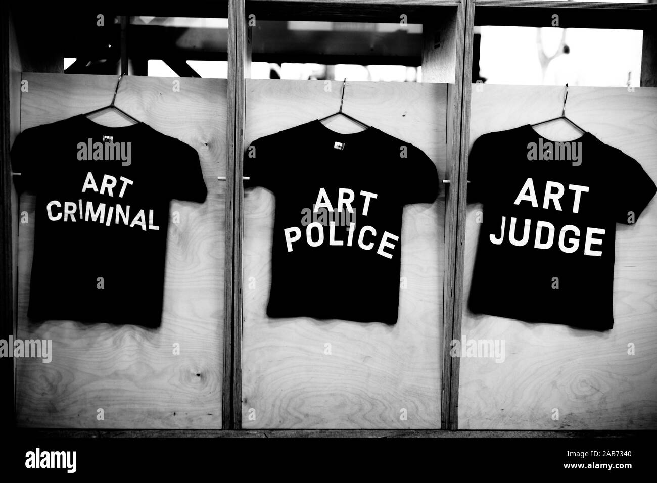 Hong Kong - November 2019 - T-shirt with words ART CRIMINAL, ART POLICE, and ART JUDGE. Stock Photo