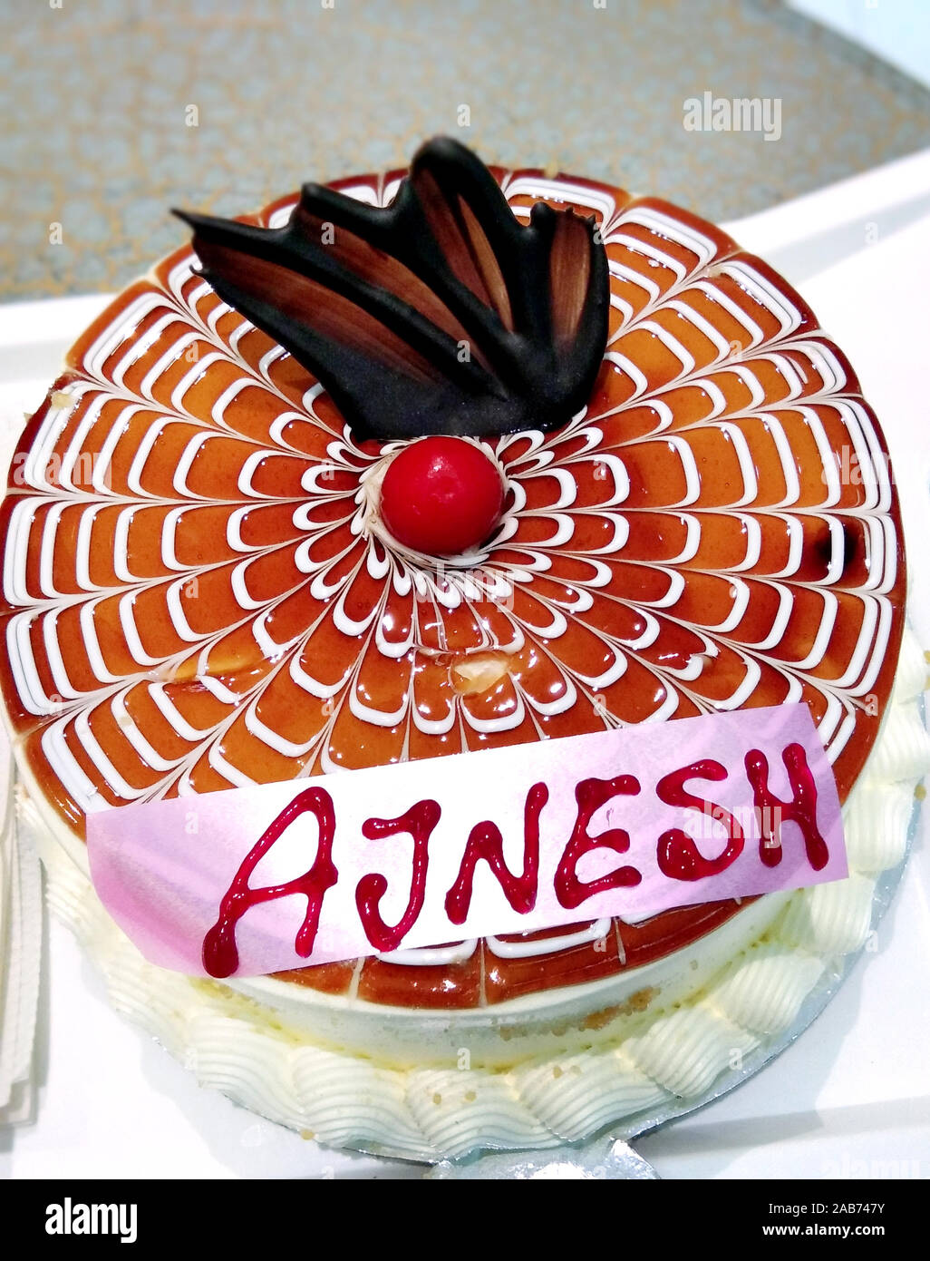 Birthday cake with colorful candles Stock Photo - Alamy