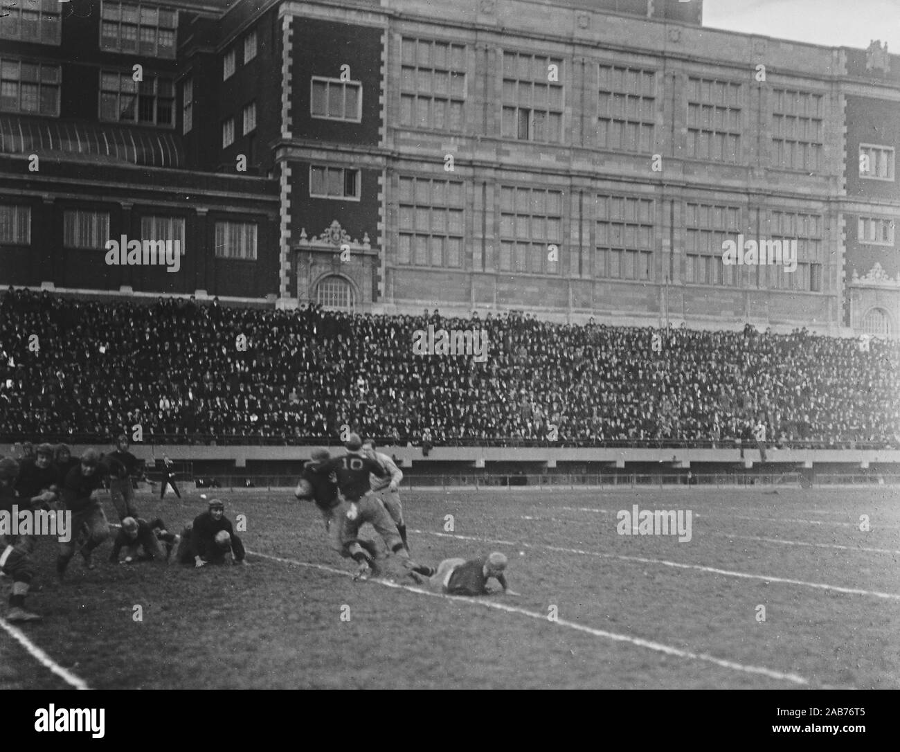 Early 20th century high school football game Black and White Stock