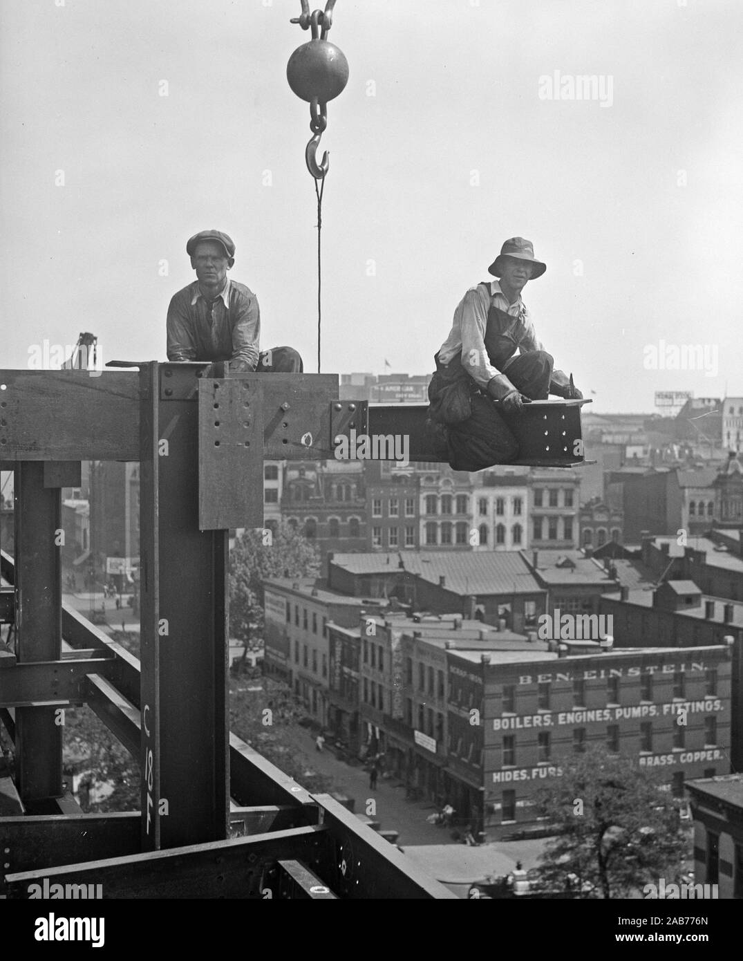 Construction workers building top Black and White Stock Photos & Images ...