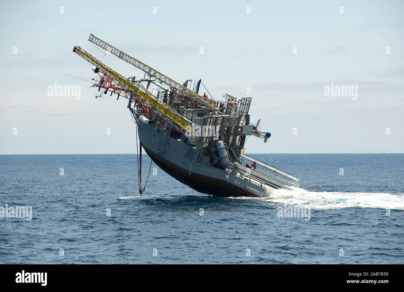 (Jun. 30, 2012) The Department of the Navy's Floating Instrument Platform (FLIP) begins the process of transitioning from horizontal to vertical by filling ballast tanks in the stern during a cruise commemorating 50 years of continuous service to the scientific community Stock Photo