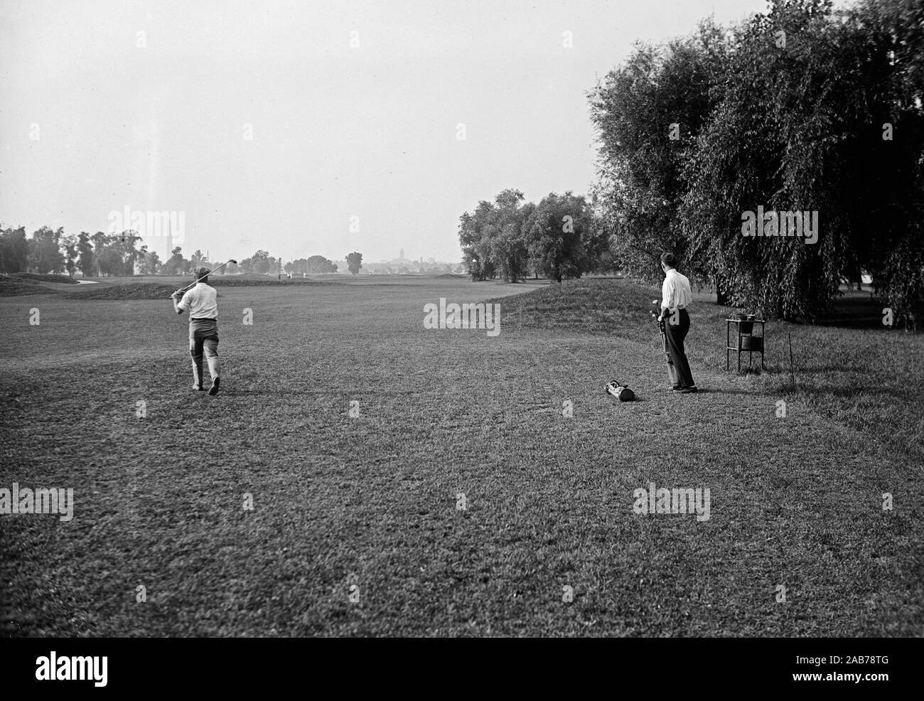 Vintage Golf Photo - A group of golfers on a golf course fairway ca. 1915-1923 Stock Photo