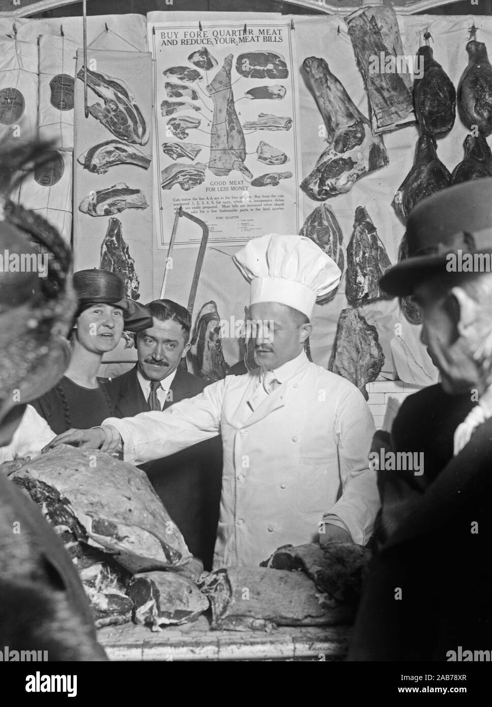 Man butchering meat ca. 1915-1923 Stock Photo - Alamy