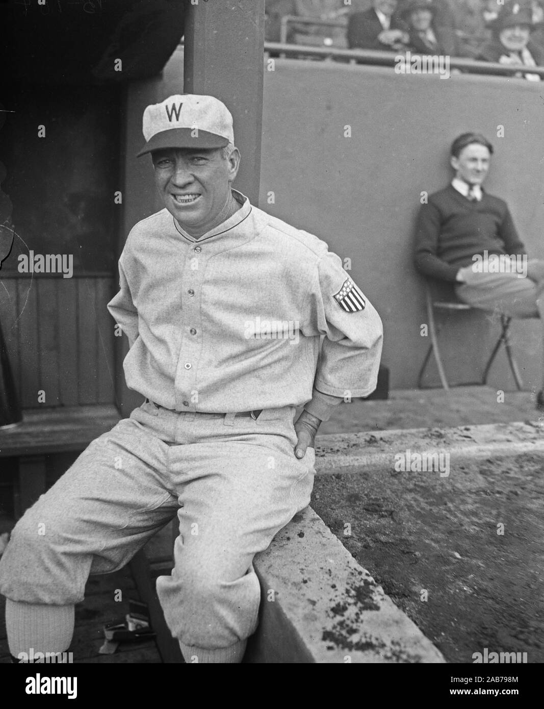 Vintage black and white photo of legendary baseball player Babe Ruth in a  shirt showing off his physique Stock Photo - Alamy