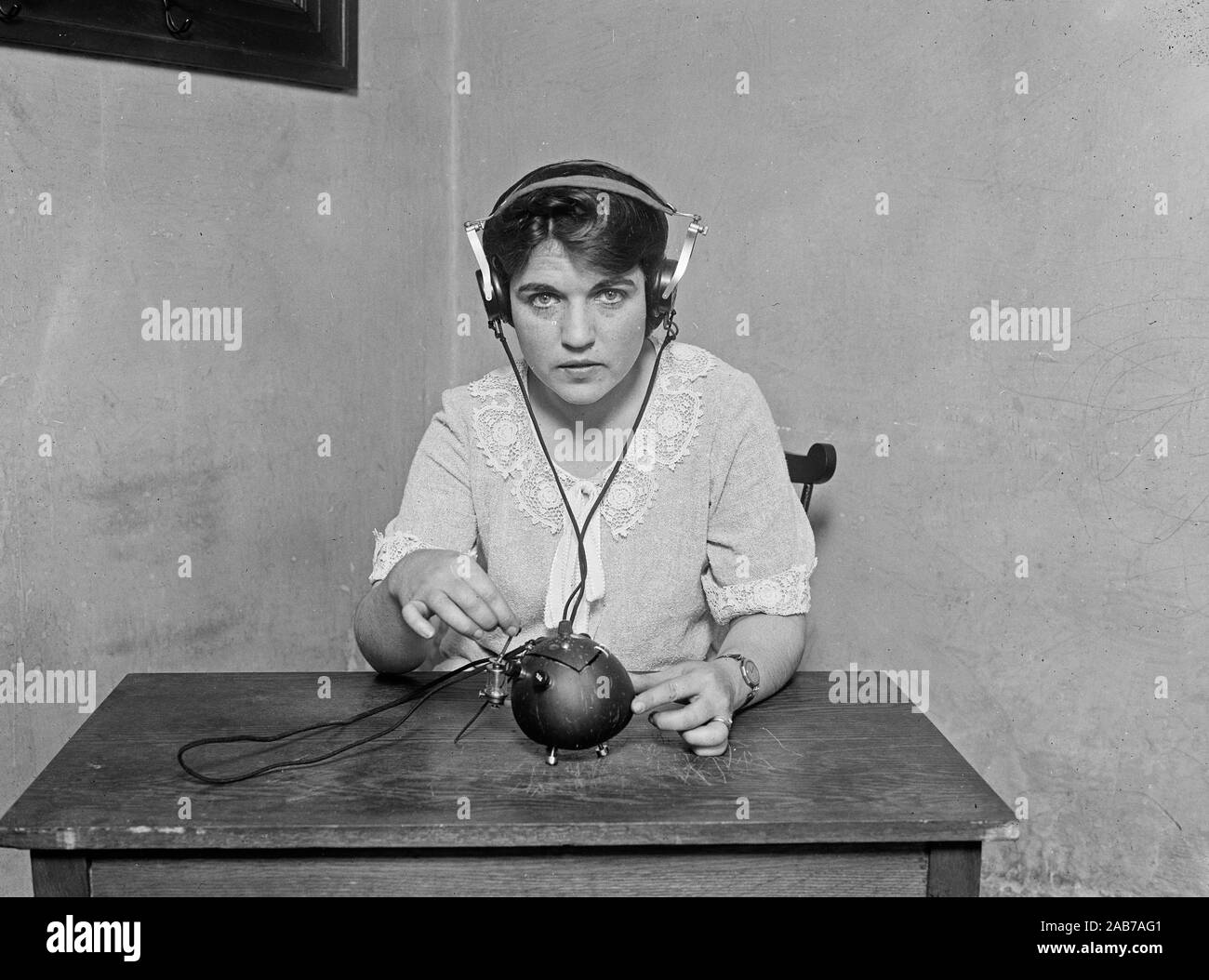 'Radio nut.' This term is certainly applicable to this receiving set for everything necessary for receiving music and speech by radio has been put into a coconut shell. It was built by H. Zamora, a native of Manila, Philippine Islands ca. June 1924 Stock Photo