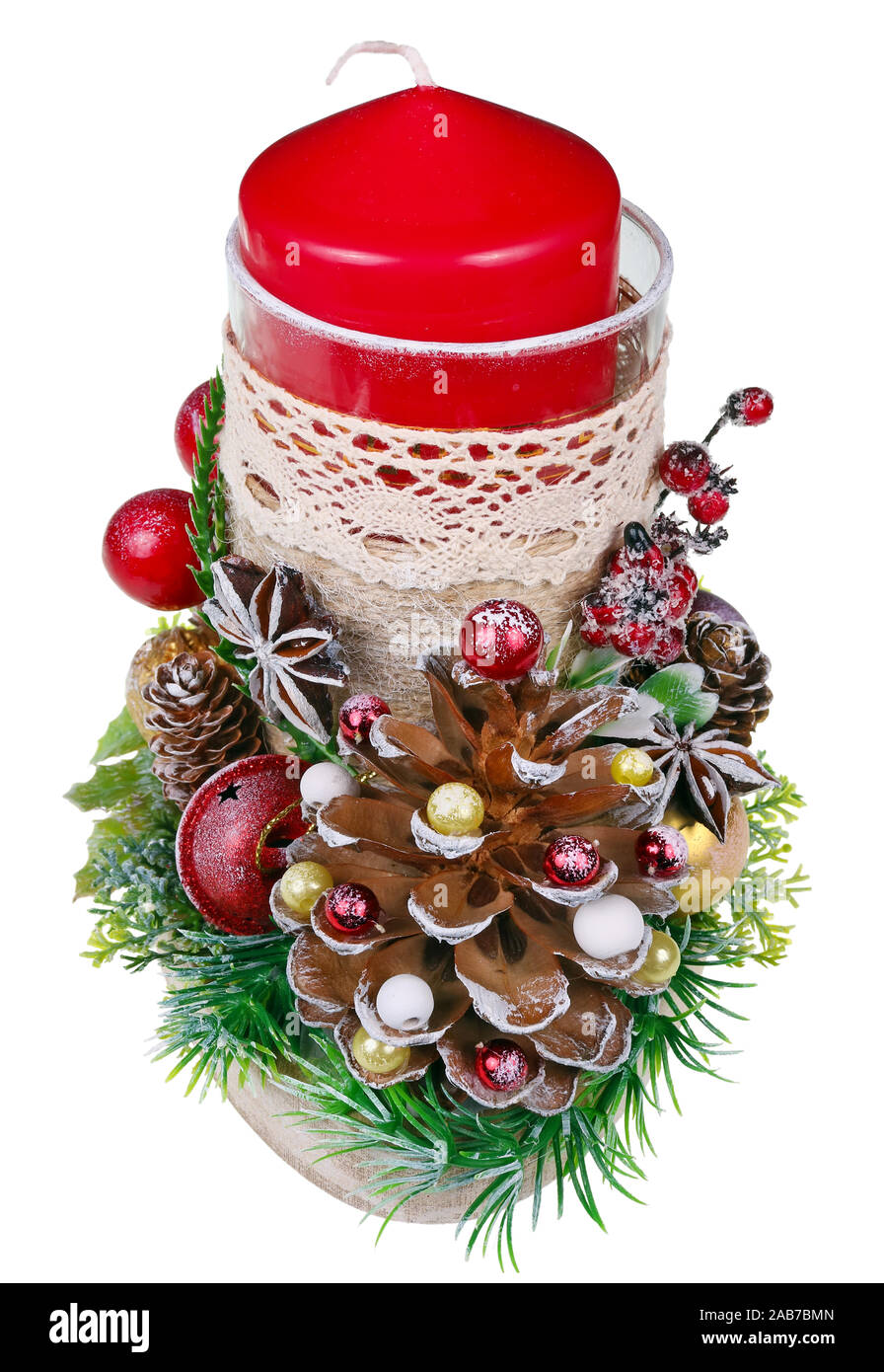 Christmas handmade candlestick with a big red candle in rustic style