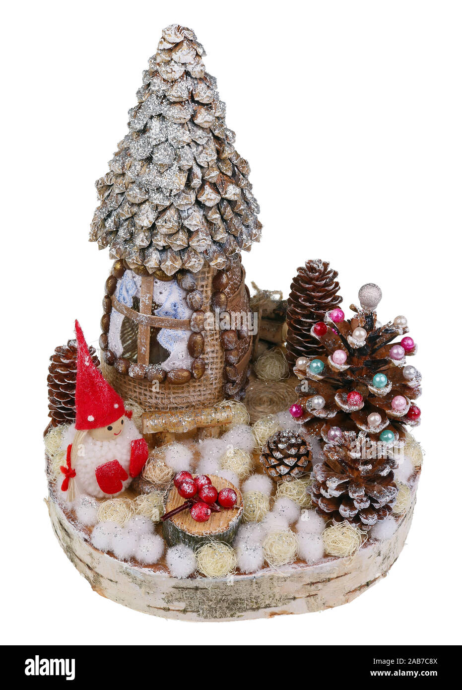 Christmas homemade  house and forest with a little gnome dwarf made of natural materials - cones, sticks, wood. Isolated on white macro Stock Photo