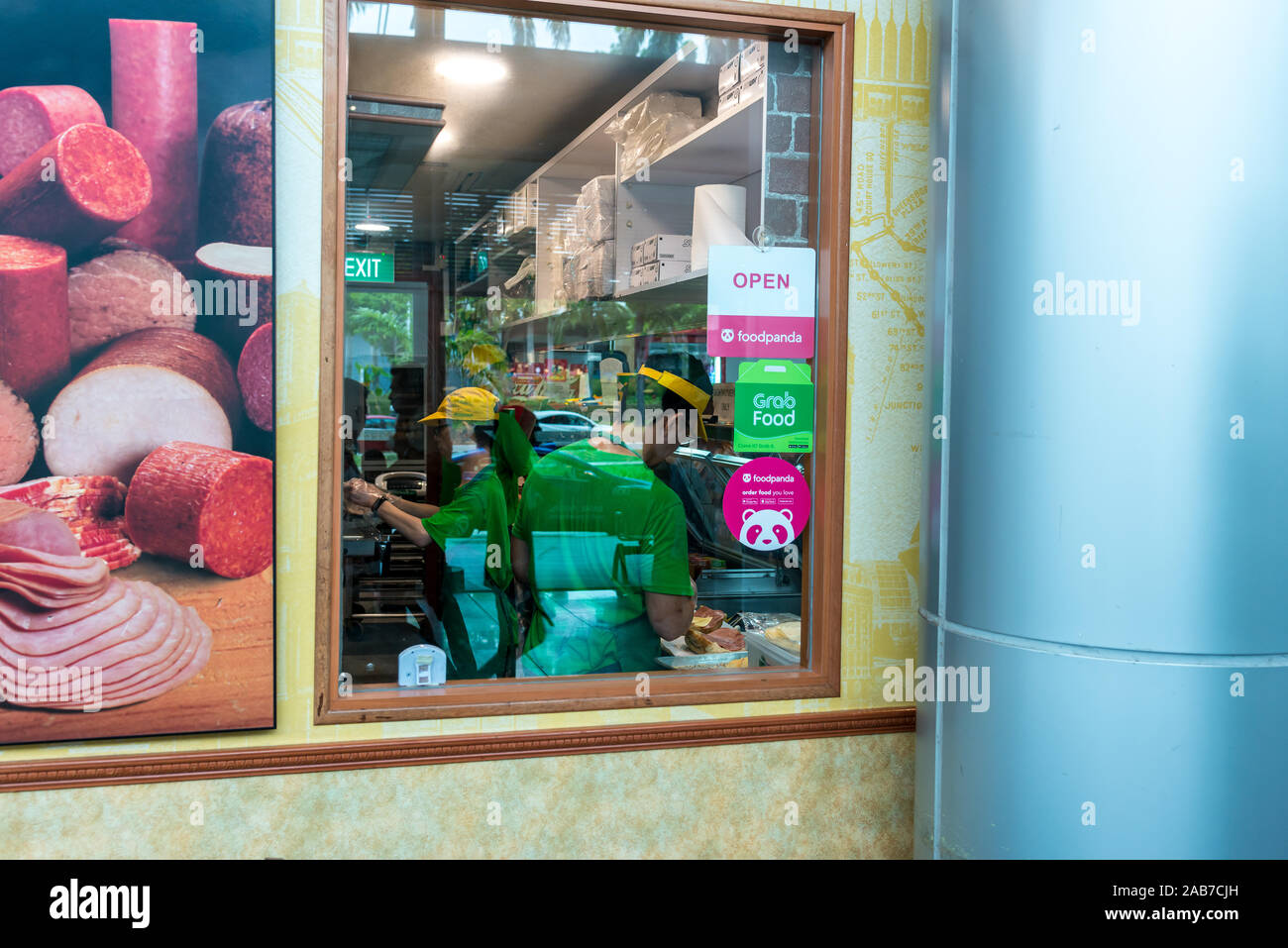 Asia / Singapore - Nov 23, 2019 : Peek. into the open concept kitchen of Subway store, a privately held American fast food restaurants franchise that Stock Photo