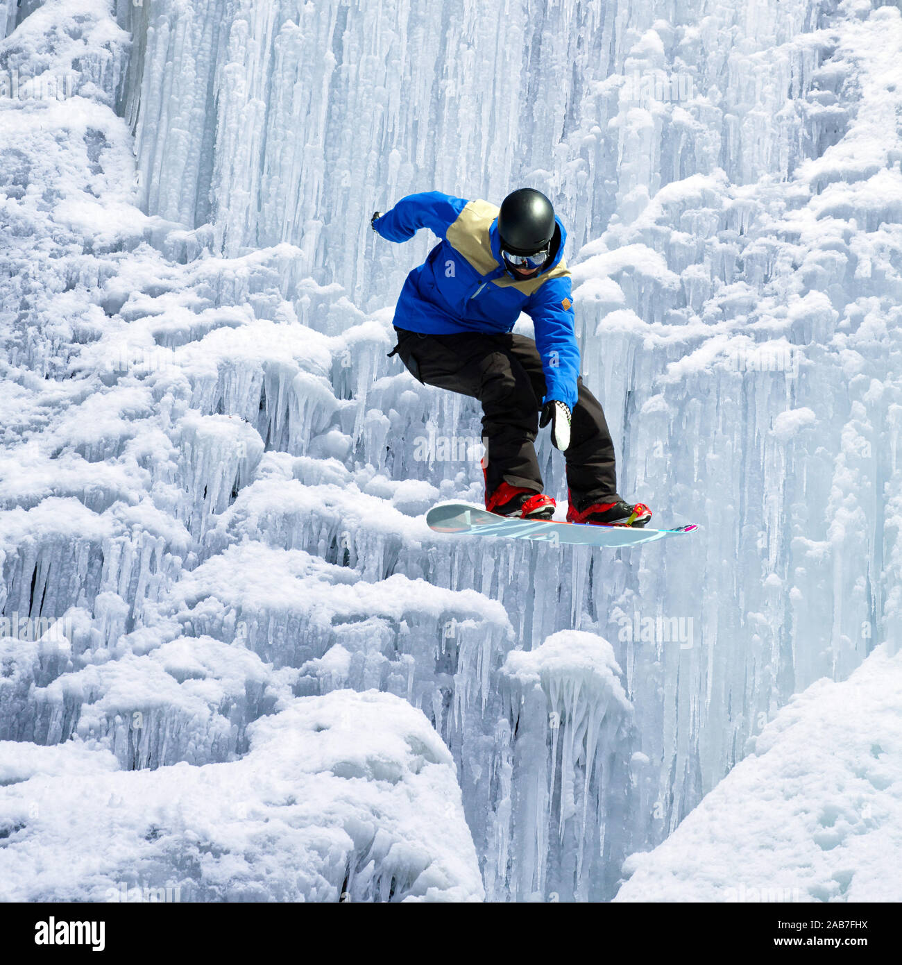 snowboarder jump of the icefall Stock Photo