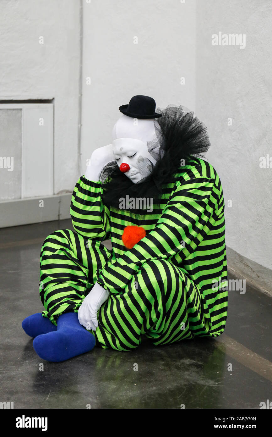 Hyper-realistic clown sculpture at 'everyone gets lighter' art exhibition by Ugo Rondinone in Helsinki, Finland Stock Photo