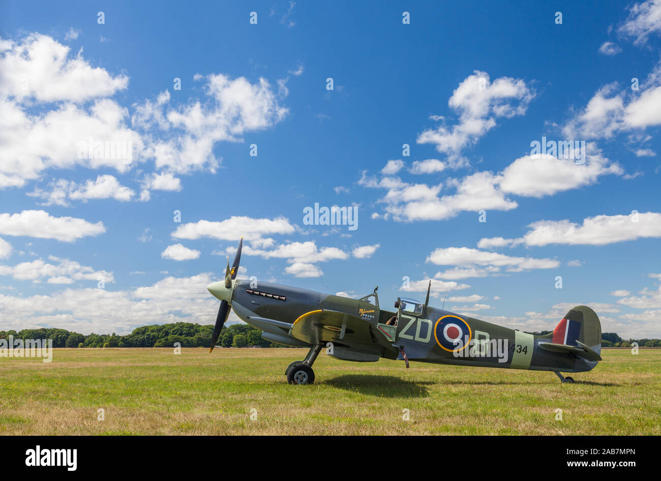 SUPERMARINE SPITFIRE MARK IXB, MH434, ENGLAND – AUGUST 11 2013, Supermarine Spitfire Mark IXb World War Two fighter plane, parked by the grass runway Stock Photo