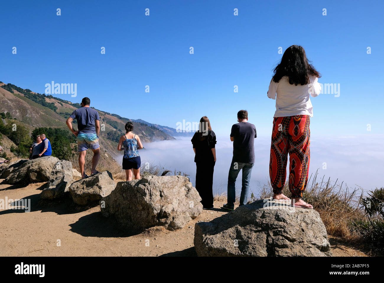 Tourists at California State Route 1, Highway 1, coastal road along the Pacific Ocean, California, USA Stock Photo