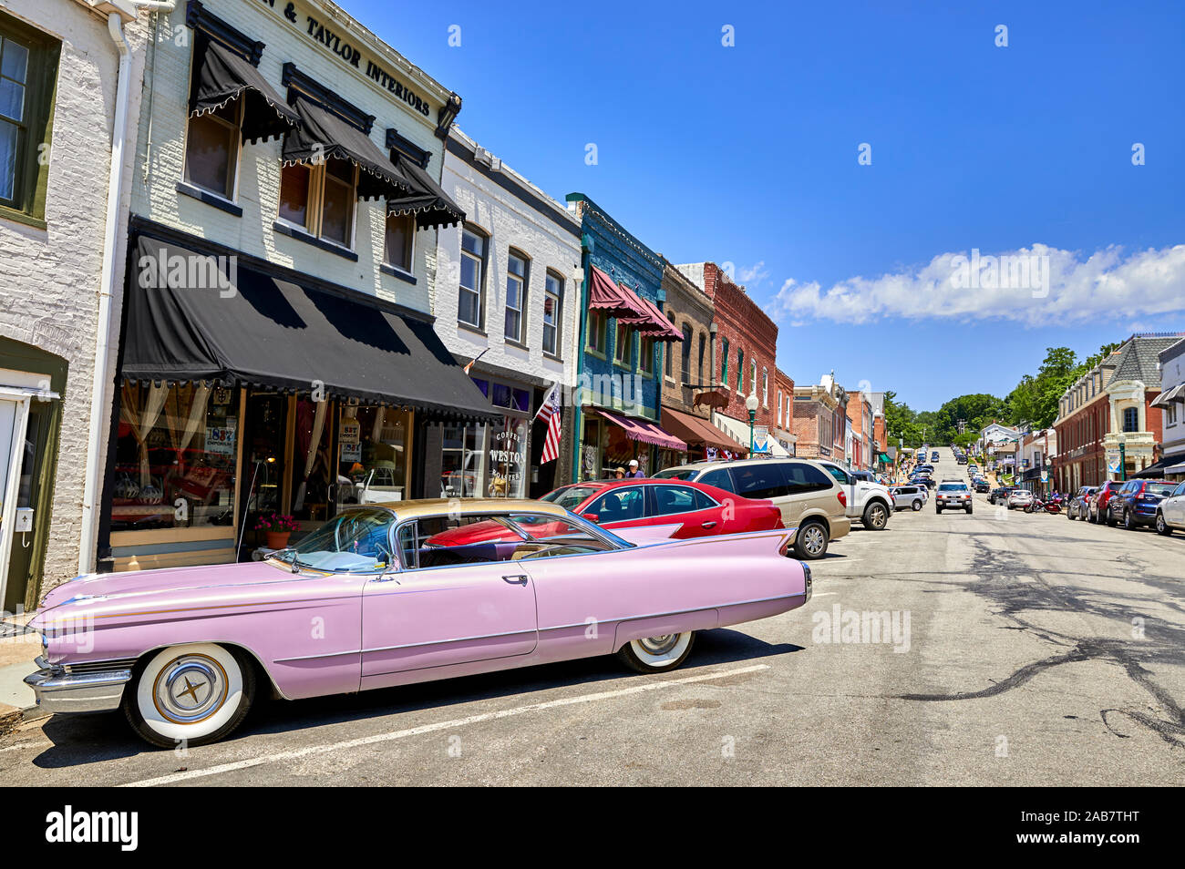 A pink 60s Cadillac in the historic old town of Weston, Missouri, North America Stock Photo