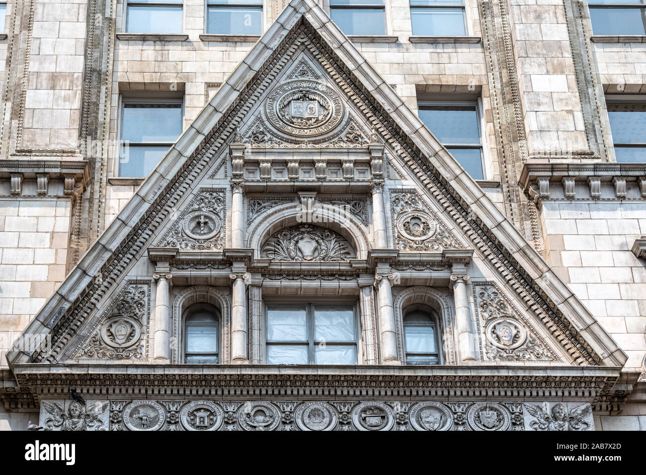 Detail of the elaborate carved pediment above the Walnut Street entrance to the Witherspoon Building, designed in 1895 by Joseph M Huston Stock Photo